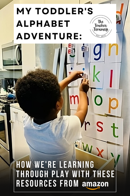 A toddler boy playing with magnetic letters and flashcards in the kitchen on the fridge